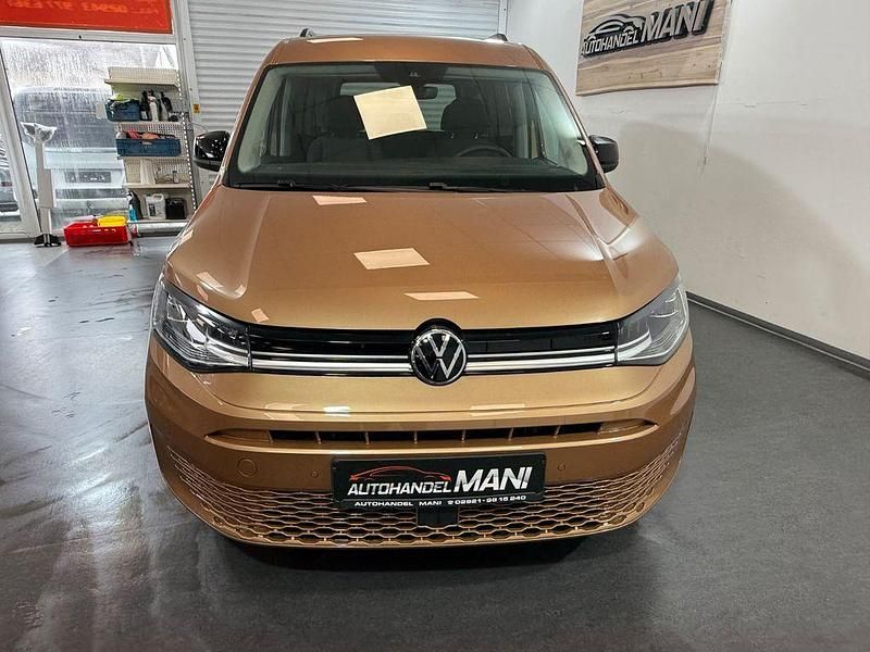 Neu VW Caddy Life 116 PS (85 kW) 2025 Gold Van / Kleinbus