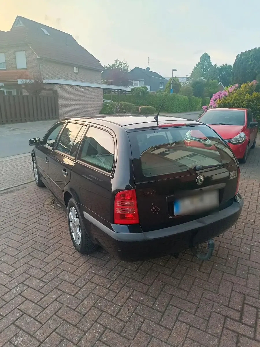 Używany Skoda Octavia 102 KM (75 kW) 2002 Czarny Kombi
