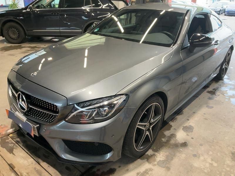 Gebraucht Mercedes C250 AMG line 204 PS (150 kW) 2018 Selenitgrau  metalliclack Coupé