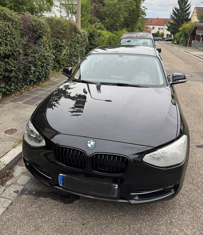 Schwarz Gebraucht 2013 BMW 116 Sport Line Kleinwagen | 7.700 € - Bild 1/4