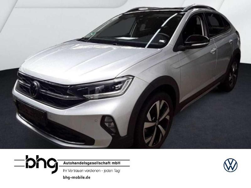 Reflexsilber metallic/schwarz Gebraucht 2023 VW Taigo Style SUV | 26.930 € (Teuer) - Bild 1/3