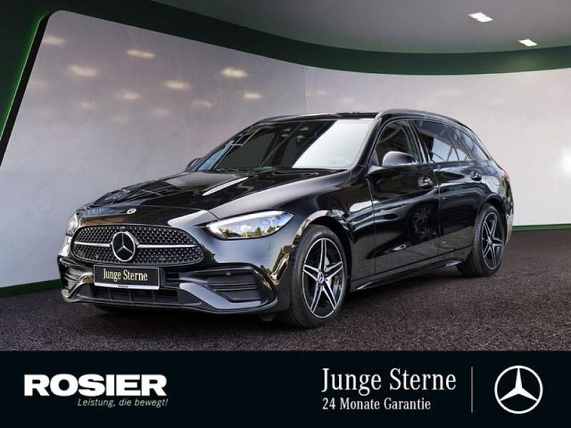 Schwarz / obsidianschwarz (metallic) Gebraucht 2023 Mercedes C300e AMG Kombi | 40.890 € (Fairer Preis) - Bild 1/4