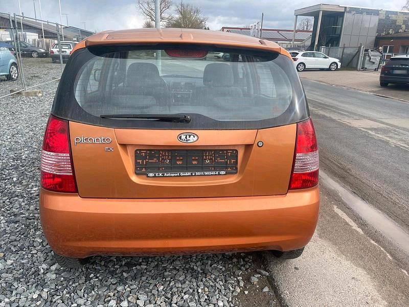 Second-hand Kia Picanto 55 CP (40 kW) 2006 Portocaliu Hatchback