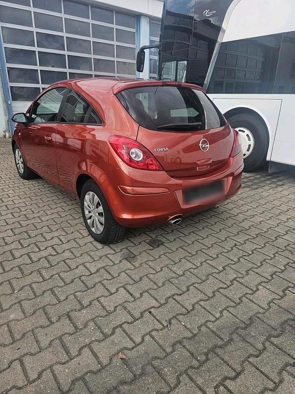Gebraucht Opel Corsa 87 PS (63 kW) 2012 Orange Kleinwagen