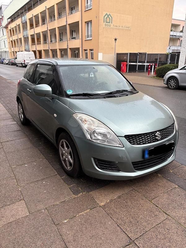 Gebraucht Suzuki Swift 94 PS (69 kW) 2011 Grün Kleinwagen