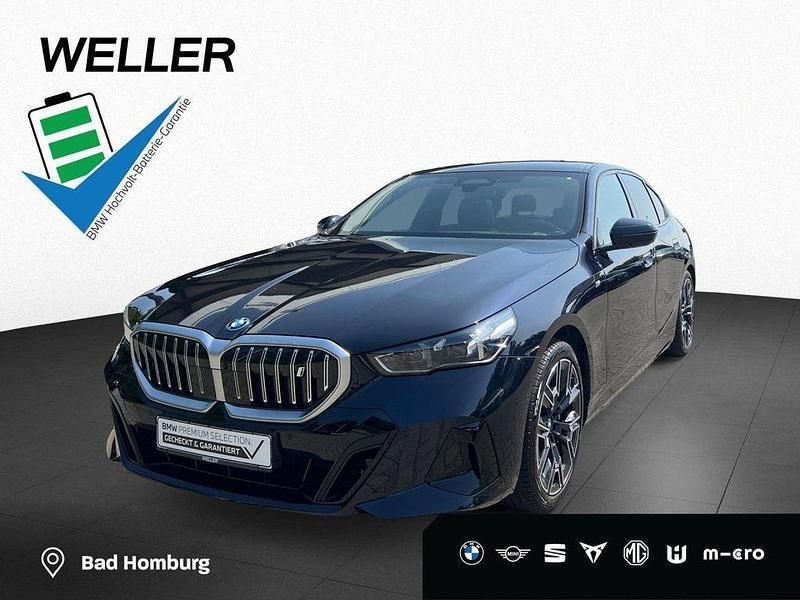 Carbonschwarz (schwarz) Gebraucht 2023 BMW i5 Comfort Edition Limousine | 58.340 € (Superpreis) - Bild 1/4