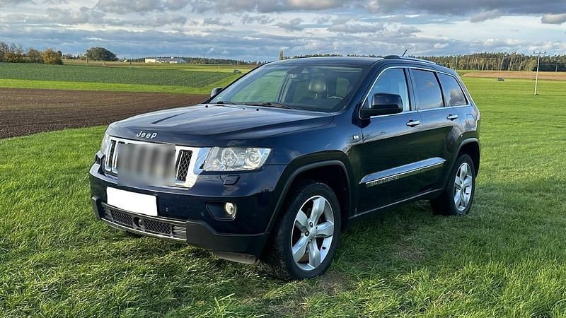 Blau Gebraucht 2013 Jeep Grand Cherokee Overland SUV | 10.850 € (Superpreis) - Bild 1/4