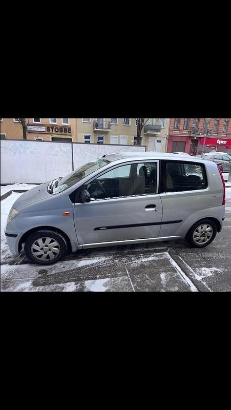Gebraucht Daihatsu Cuore 60 PS (44 kW) 2003 Kleinwagen
