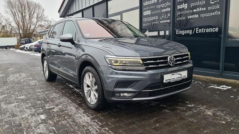 Grau Gebraucht 2018 VW Tiguan Allspace Highline SUV | 17.990 € (Fairer Preis) - Bild 1/4