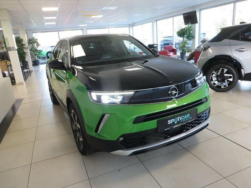 Grün Gebraucht 2021 Opel Mokka-e Ultimate SUV | 15.980 € (Fairer Preis) - Bild 1/4