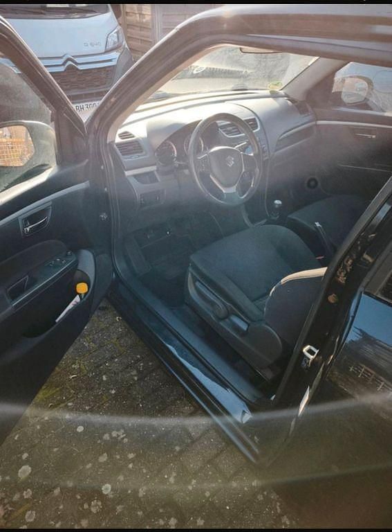 Gebraucht Suzuki Swift 94 PS (69 kW) 2012 Schwarz Kleinwagen