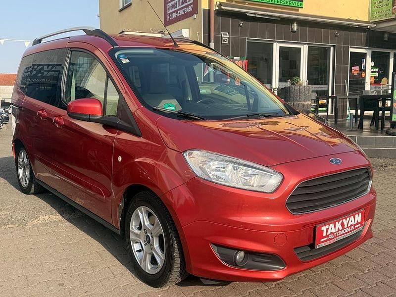 Gebraucht Ford Tourneo Courier Titanium 101 PS (74 kW) 2014 Orange Van / Kleinbus
