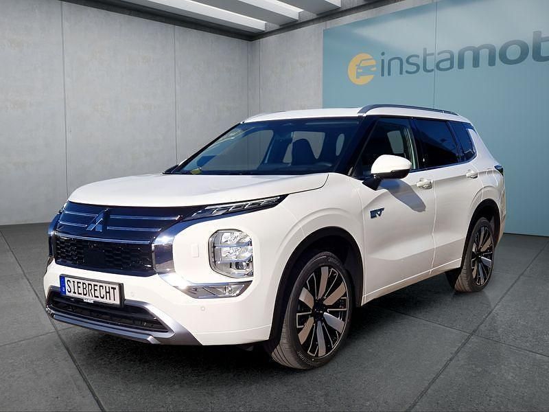 Weiß Neu 2025 Mitsubishi Outlander P-HEV Top SUV | 55.299 € (Etwas zu teuer) - Bild 1/4