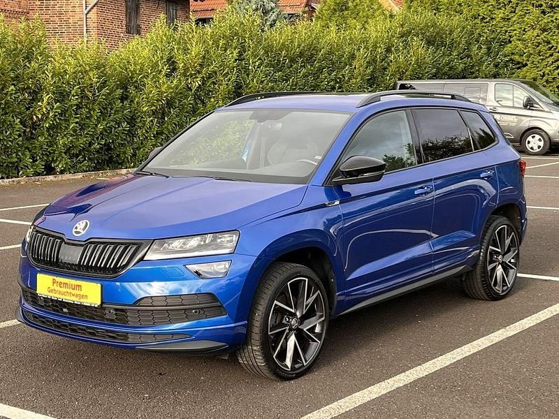 Raceblau Gebraucht 2021 Skoda Karoq SportLine SUV | 25.990 € (Fairer Preis) - Bild 1/4