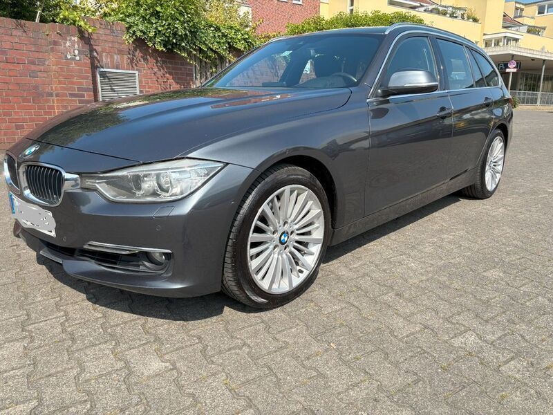 Grau Gebraucht 2012 BMW 330 Luxury Line Kombi | 8.900 € (Teuer) - Bild 1/4