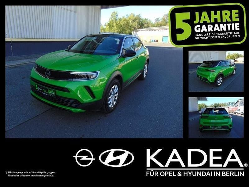 Matcha green/ikone gruen (metallic) Gebraucht 2021 Opel Mokka-e Edition SUV | 15.950 € (Superpreis) - Bild 1/4
