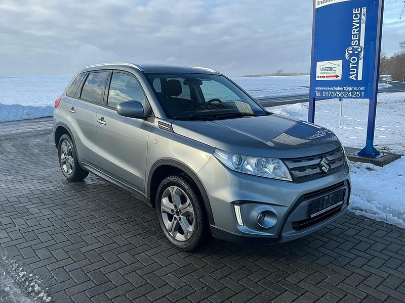 Grau Gebraucht 2016 Suzuki Vitara SUV | 14.380 € (Fairer Preis) - Bild 1/4