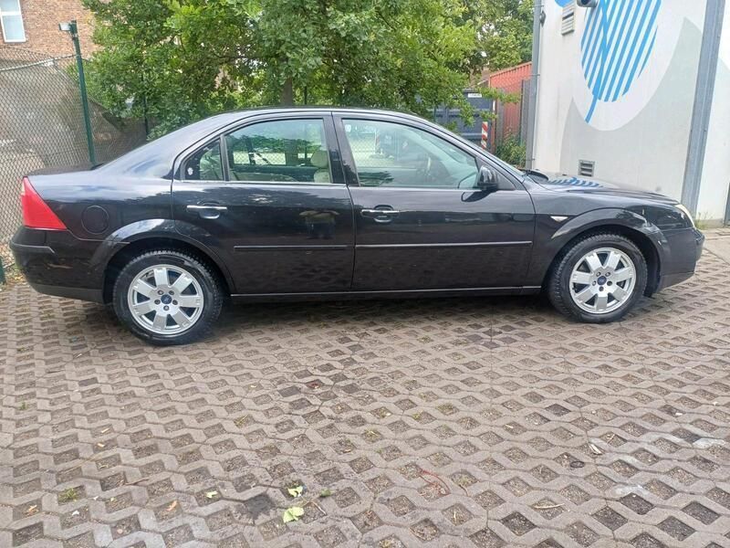 Schwarz Gebraucht 2004 Ford Mondeo Ghia Limousine | 1.290 € (Superpreis) - Bild 1/4