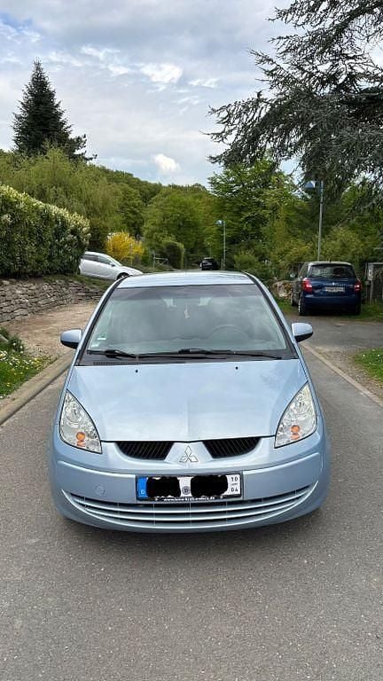 Second-hand Mitsubishi Colt Invite 95 CP (69 kW) 2006 Albastru Berlinǎ