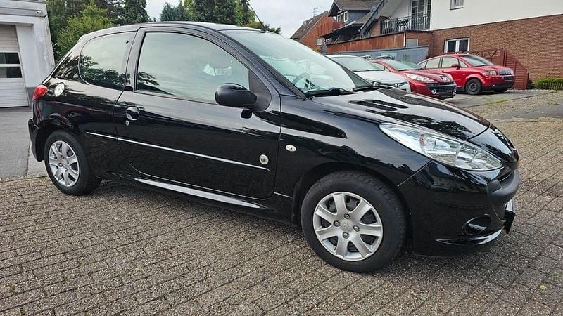 Gebraucht Peugeot 206+ 73 PS (53 kW) 2012 Lackierung schwarz perla nera/ Kleinwagen