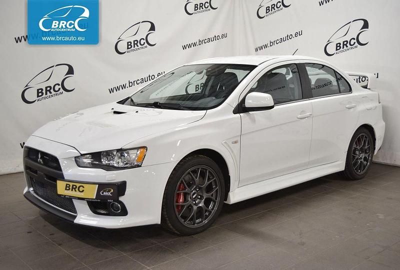 Weiß Gebraucht 2014 Mitsubishi Lancer Limousine | 37.400 € - Bild 1/4