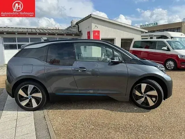 Gebraucht BMW i3 135 kW (184 PS) 2022 Mineralgrau metallic mit akzen Kleinwagen