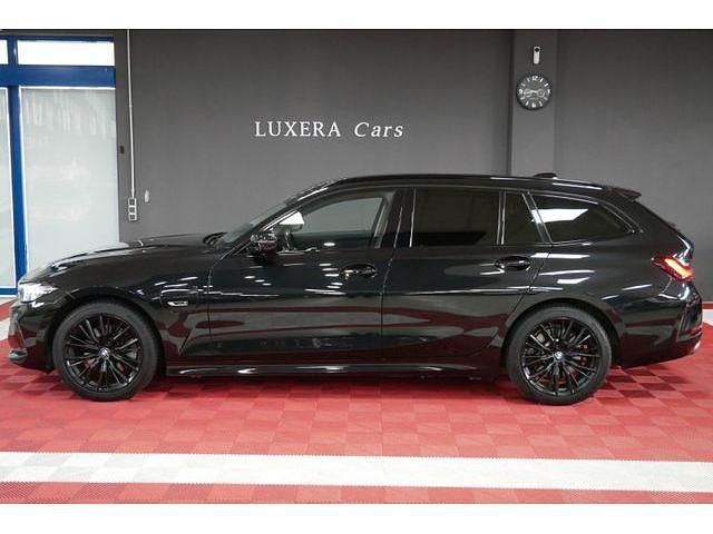 Gebraucht BMW 330e Sport Line 292 PS (214 kW) 2022 Schwarz Kombi