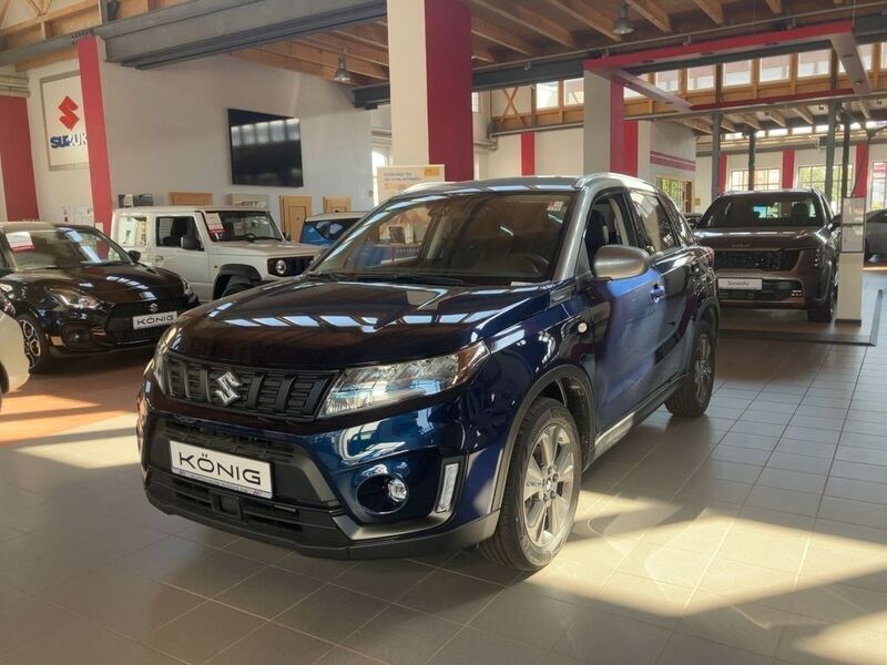 Blau Gebraucht 2024 Suzuki Vitara Comfort SUV | 21.888 € - Bild 1/4