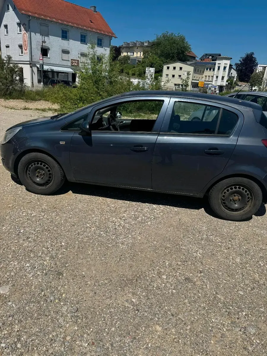 Usado Opel Corsa 90 HP (66 kW) 2008 Cinzento Citadino