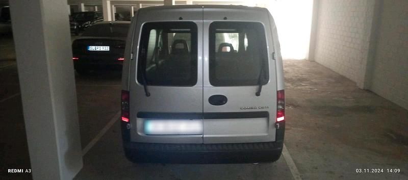 Second-hand Opel Combo 75 CP (55 kW) 2010 Argintiu Monovolum