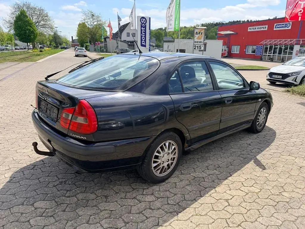 Gebraucht Mitsubishi Carisma 125 PS (91 kW) 2003 Schwarz Limousine
