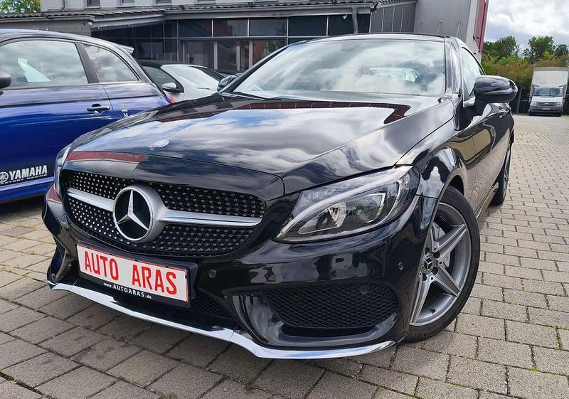Schwarz Gebraucht 2017 Mercedes C200 AMG line Coupé | 25.999 € (Fairer Preis) - Bild 1/4