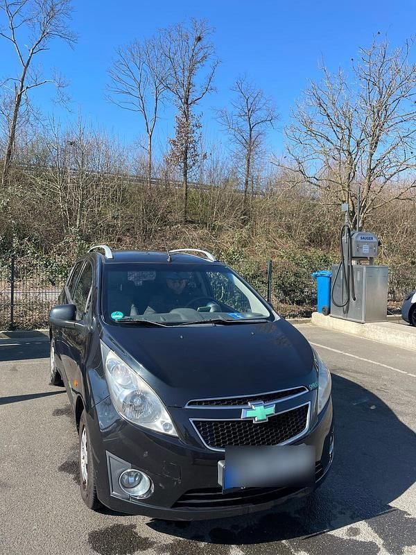 Schwarz Gebraucht 2011 Chevrolet Spark Kleinwagen | 2.000 € - Bild 1/4