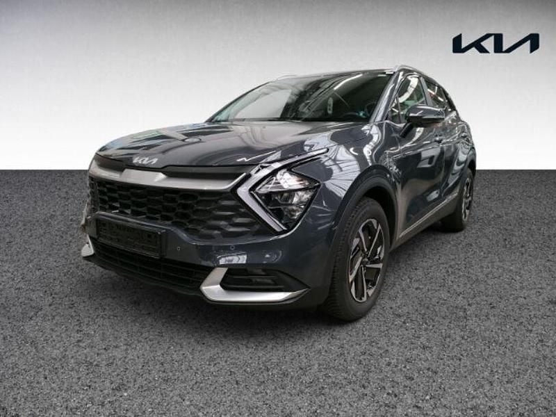 H8g) pentametal met. (grau Gebraucht 2024 Kia Sportage Vision SUV | 30.880 € (Superpreis) - Bild 1/4