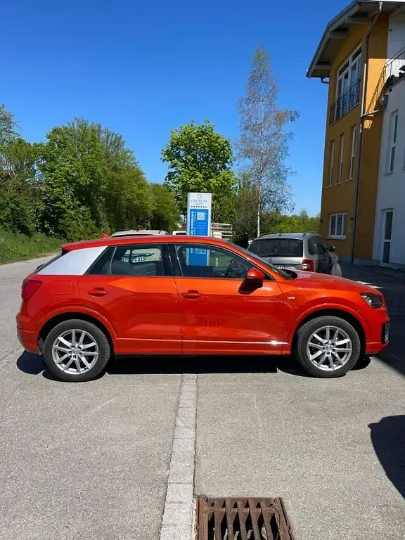 Używany Audi Q2 S-Line 150 KM (110 kW) 2017 Pomarańczowy SUV