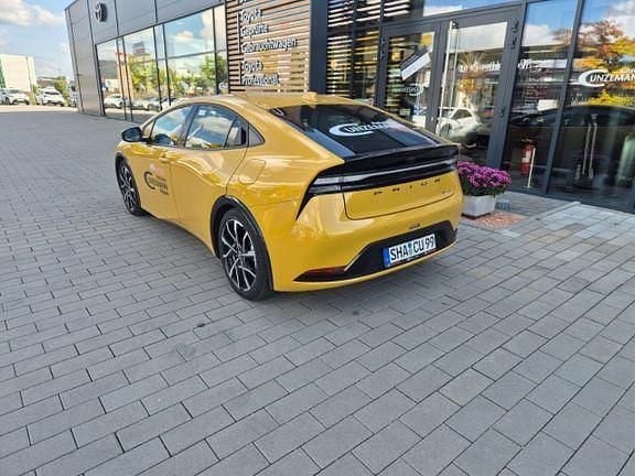 Gebraucht Toyota Prius Executive 223 PS (164 kW) 2023 Mustard metallic Kleinwagen