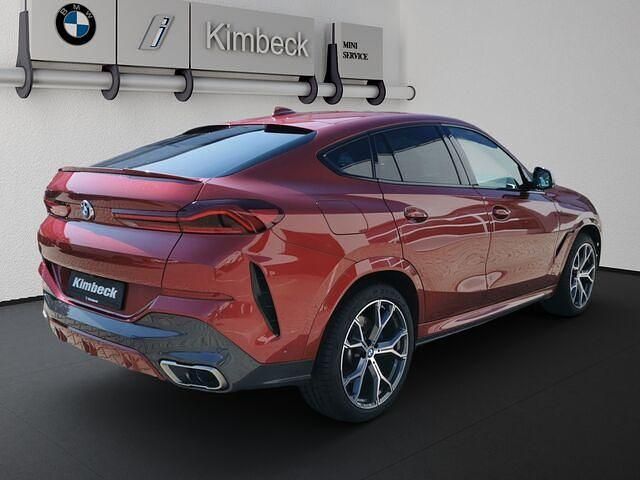 Gebraucht BMW X6 M50 Shadowline 400 PS (294 kW) 2020 Flamencorot brillanteffekt met SUV