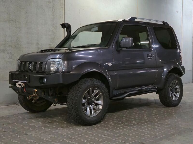 Grau Gebraucht 2018 Suzuki Jimny SUV | 22.350 € (Teuer) - Bild 1/4