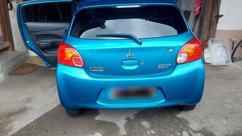 Second-hand Mitsubishi Space Star 80 CP (58 kW) 2013 Albastru Monovolum