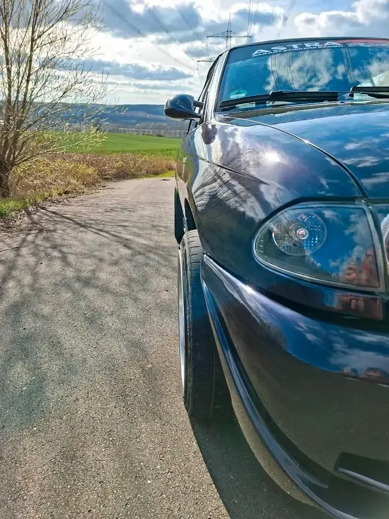 Używany Opel Astra Cabriolet 115 KM (84 kW) 1994 Purpurowy Kabriolet