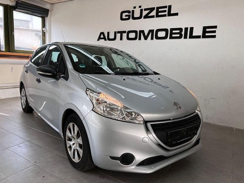 Grau Gebraucht 2014 Peugeot 208 Access Kleinwagen | 6.499 € (Fairer Preis) - Bild 1/4