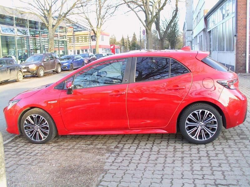 Gebraucht Toyota Corolla Hybrid Team 122 PS (89 kW) 2021 Rot Limousine