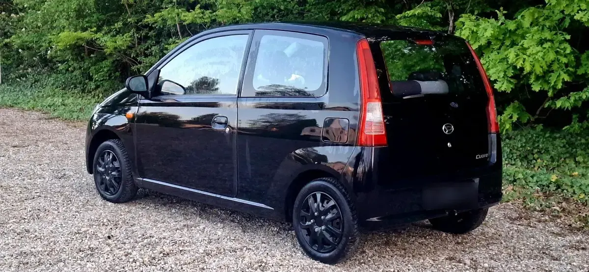 Gebraucht Daihatsu Cuore 43 PS (31 kW) 2005 Schwarz Kleinwagen