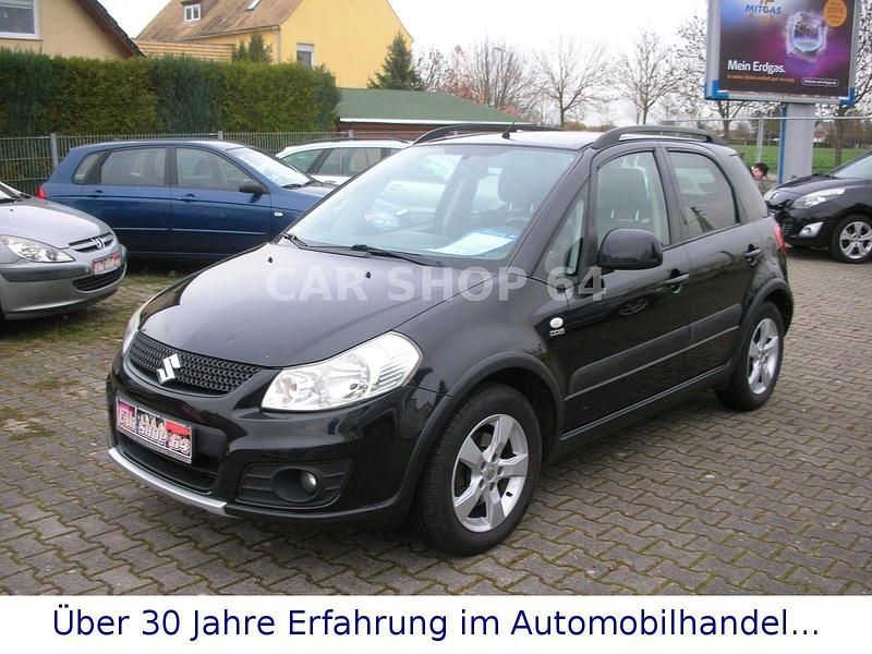 Schwarz Gebraucht 2013 Suzuki SX4 Club Limousine | 4.999 € (Fairer Preis) - Bild 1/4