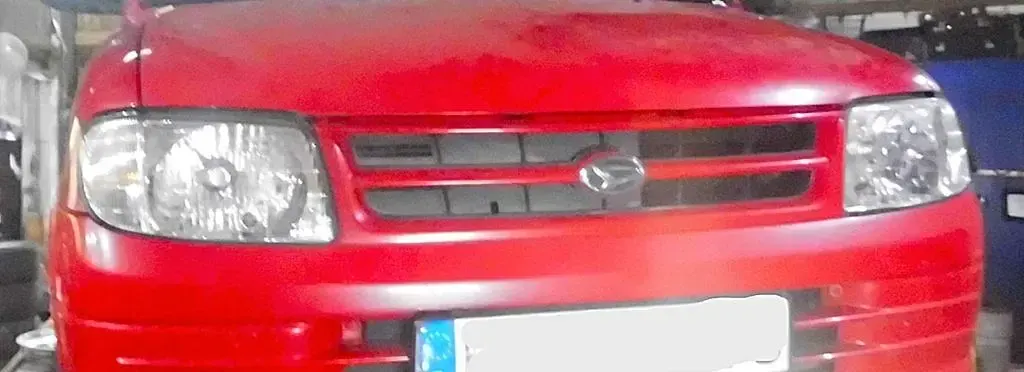 Gebraucht Daihatsu Cuore Plus 56 PS (41 kW) 1998 Rot Kleinwagen