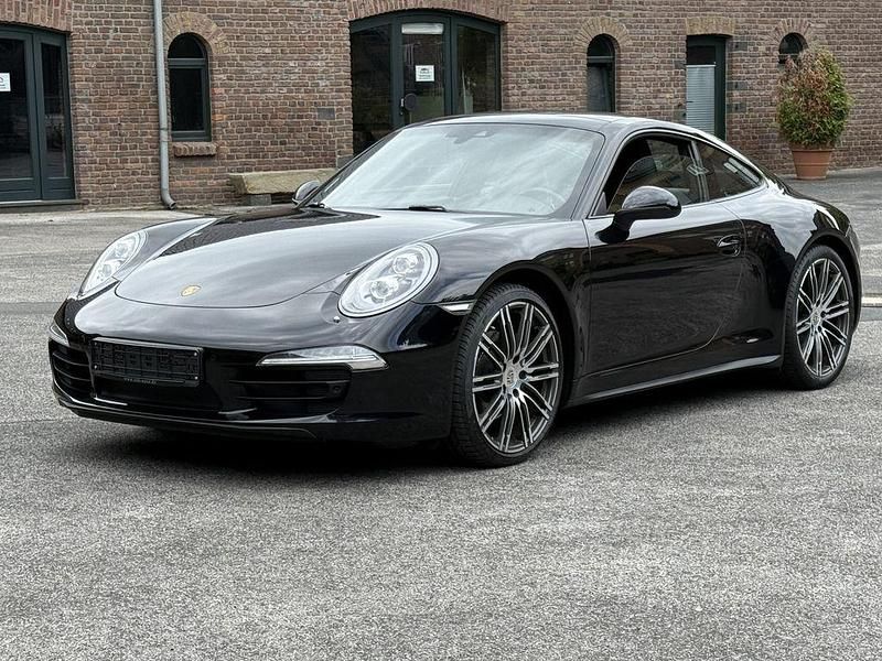 Schwarz Gebraucht 2015 Porsche 911 Carrera 4 Black Edition Coupé | 69.790 € - Bild 1/4