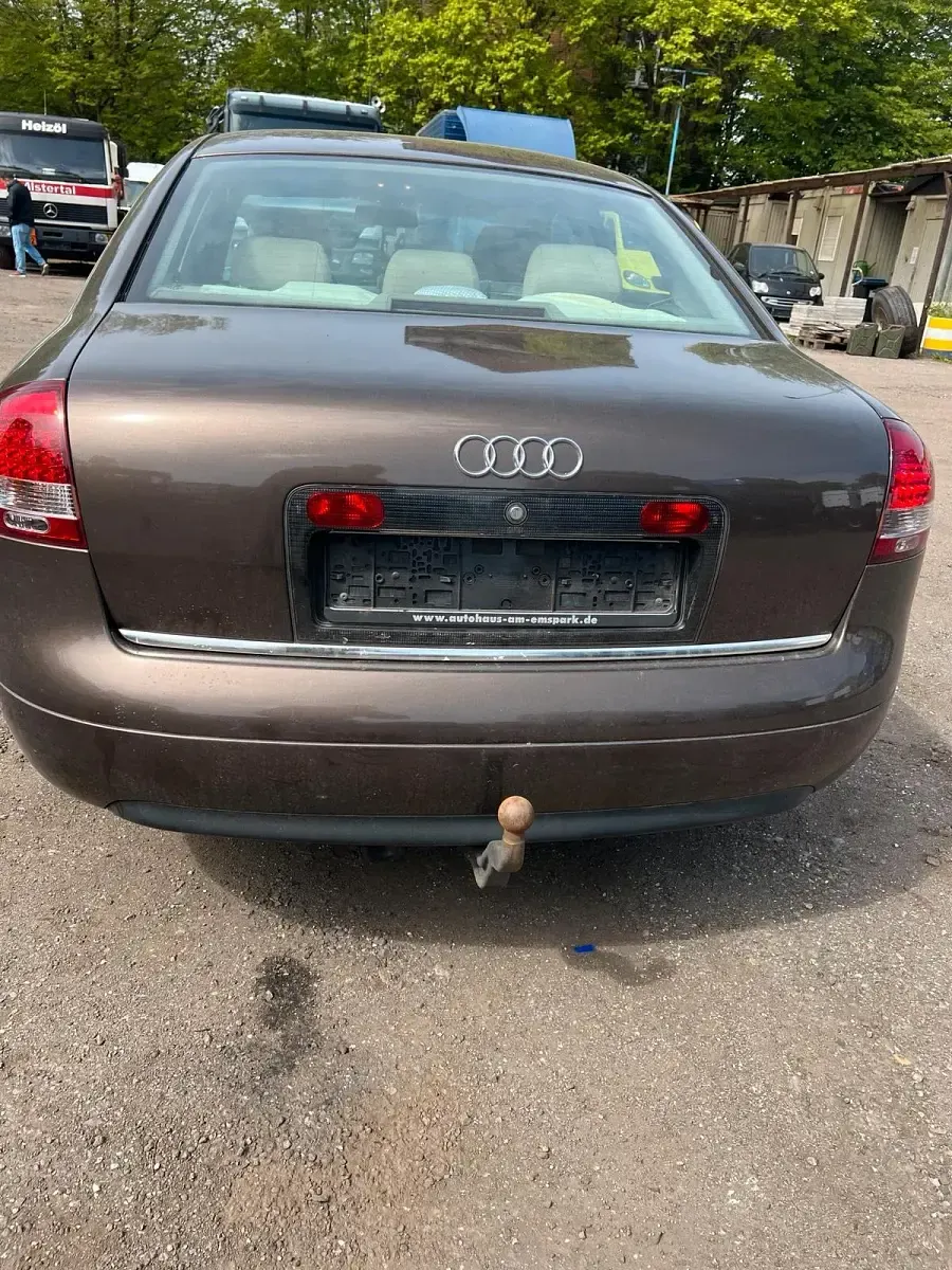 Używany Audi A6 125 KM (91 kW) 1998 Szary Sedan/Limuzyna