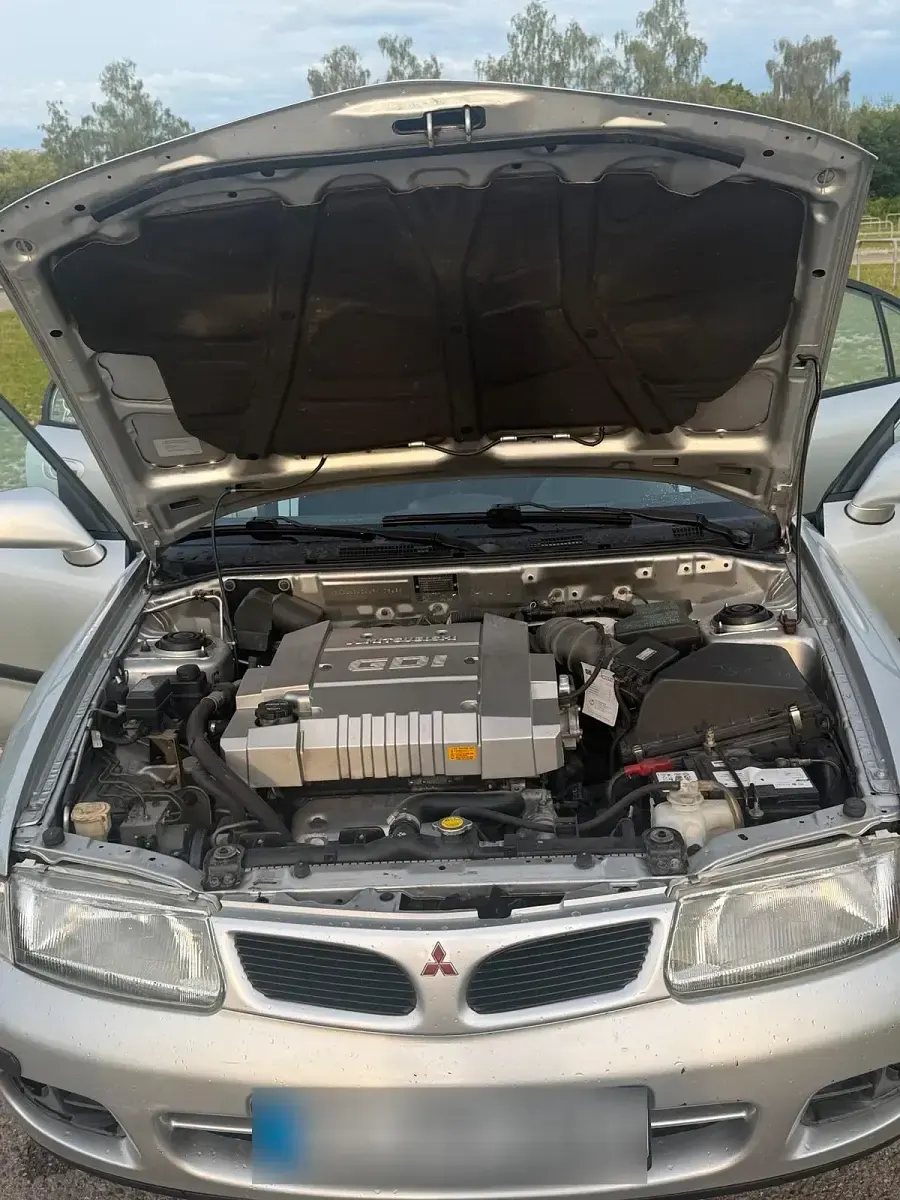 Gebraucht Mitsubishi Carisma 125 PS (91 kW) 1998 Silber Limousine