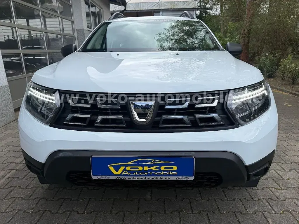 Używany Dacia Duster Acces 91 KM (66 kW) 2021 Biały SUV