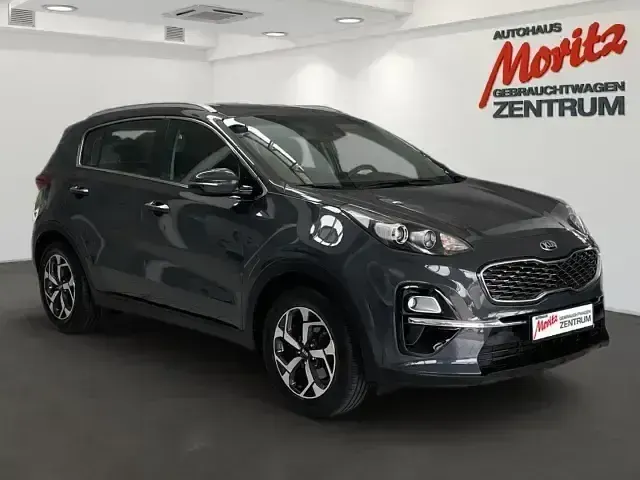 Gebraucht Kia Sportage Vision 177 PS (130 kW) 2020 H8g) pentametal met. (grau SUV